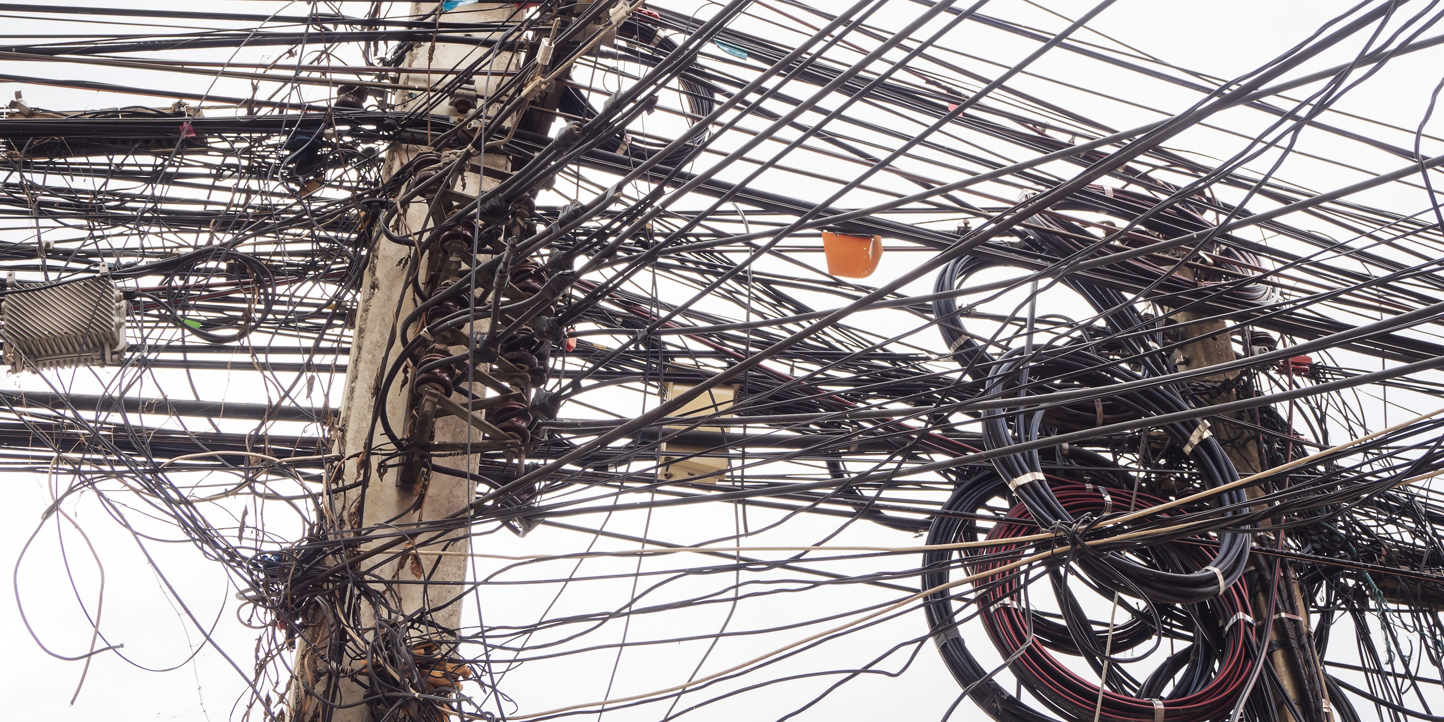 Chaos of cables and wires on electric pole in Chiang Mai,Thailan